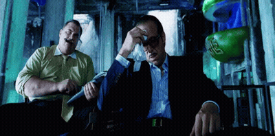 Two Men, One With Green Boxing Glove And Letter S GIF