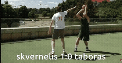 Two Men Playing Basketball One Wearing 77 Jersey GIF