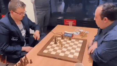 Two Men Playing Chess GIF