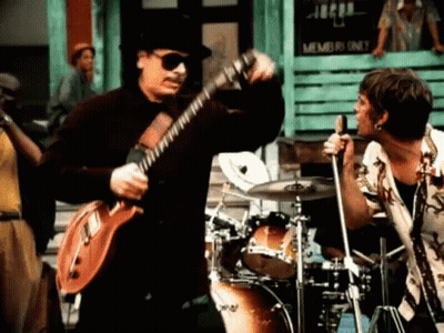 Two Men Playing Guitar And Drums GIF