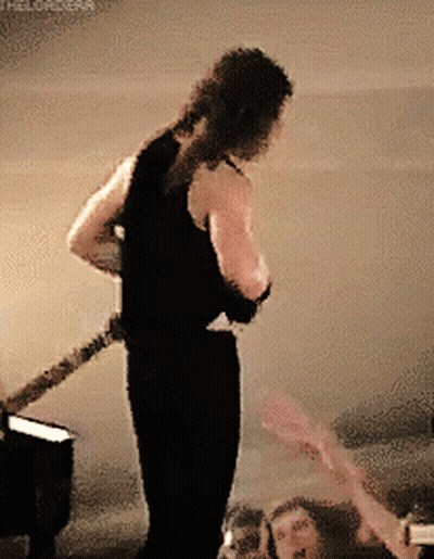 Two Men Playing Guitars, One In Psychokiller Tank Top GIF