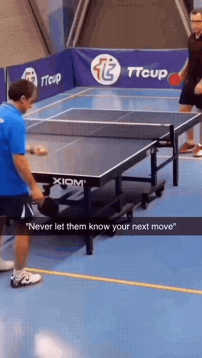 Two Men Playing Ping Pong GIF
