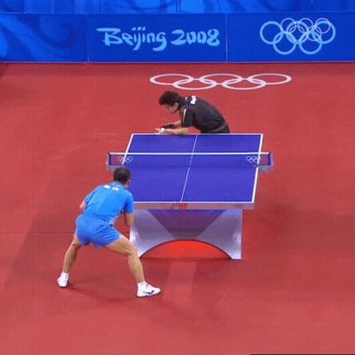 Two Men Playing Ping Pong GIF