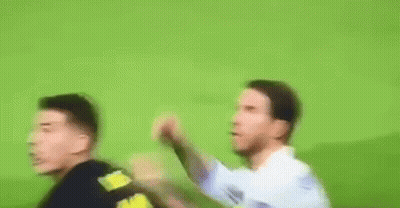 Two Men Playing Soccer GIF