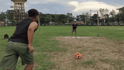 Two Men Playing Soccer One In Black Shirt GIF