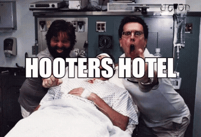 Two Men Pointing At Hospital Bed GIF