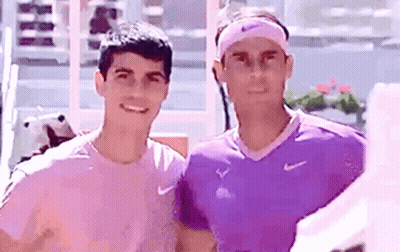 Two Men Posing One Wearing Headband GIF