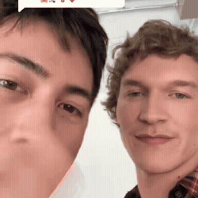Two Men Posing With Speech Bubble Saying I Love You GIF