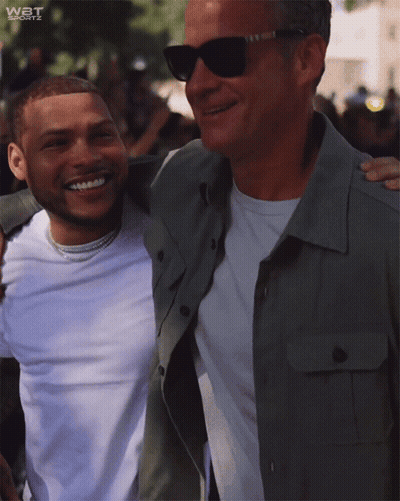 Two Men Posing With WBT Sports GIF