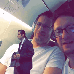 Two Men Reaction To Confused Actor John Travolta GIF