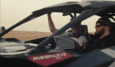 Two Men Riding In A Maverick RR ATV GIF