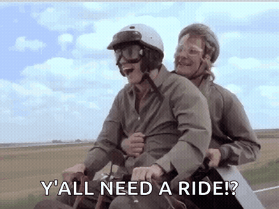 Two Men Riding Motorcycle One Asking Yall Need Ride GIF