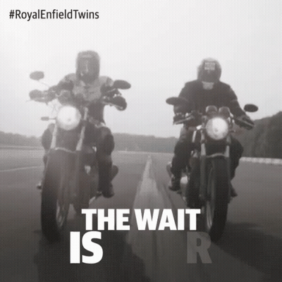 Two Men Riding Motorcycles Saying The Wait Is R GIF