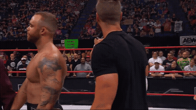 Two Men Ring With Fake Love Care Sign GIF