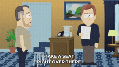 Two Men Say Take Seat Right Over There GIF