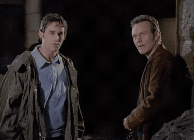 Two Men Saying We're Dumb GIF