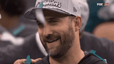 Two Men Shaking Hands And Walking Away GIF