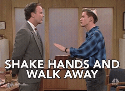 Two Men Shaking Hands And Walking Away GIF