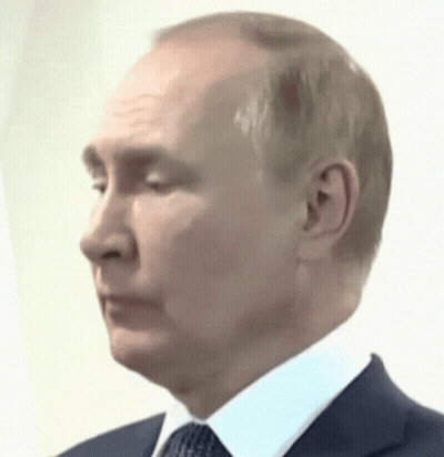 Two Men Shaking Hands On Red Carpet GIF