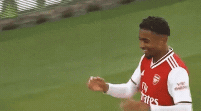 Two Men Shaking Hands On Soccer Field GIF