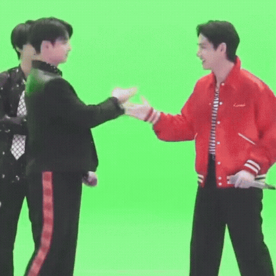 Two Men Shaking Hands One In Red Jacket GIF