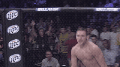 Two Men Shaking Hands Reebok Sign GIF