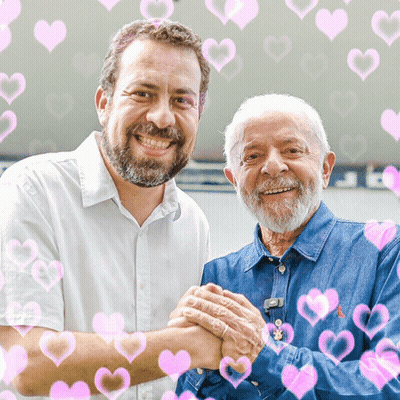 Two Men Shaking Hands With Pink Hearts GIF