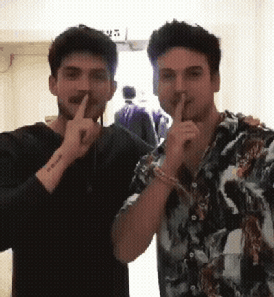 Two Men Shushing GIF