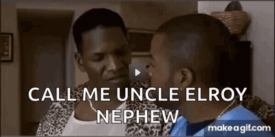 Two Men Sitting And Talking In Living Room GIF