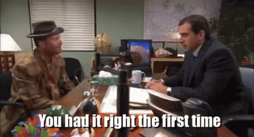 Two Men Sitting At A Desk With The Words You Had It Right The First Time Written On The Bottom GIF