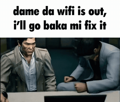 Two Men Sitting At A Table With The Words Dame Da Wifi Is Out And I 'Ll Go Baka Mi Fix It GIF