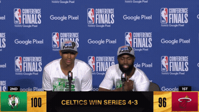 Two Men Sitting At Conference Finals Wall GIF