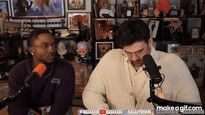 Two Men Sitting At Microphone GIF
