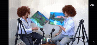 Two Men Sitting At Microphones Holding Paintings Ideashop GIF