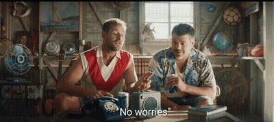 Two Men Sitting At Table With Radio And Soda GIF