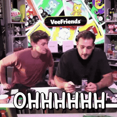 Two Men Sitting At Veefriends Sign GIF