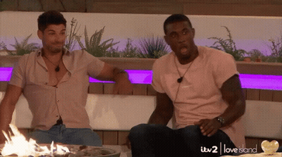 Two Men Sitting By ITV2 Love Island Fire Pit GIF