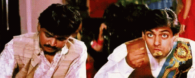 Two Men Sitting Eating Food GIF