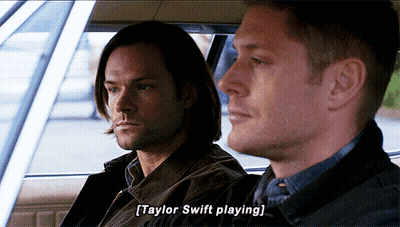 Two Men Sitting In Car Talking About Taylor Swift GIF