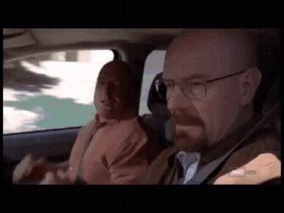 Two Men Sitting In Car With Breaking Bad Logo GIF