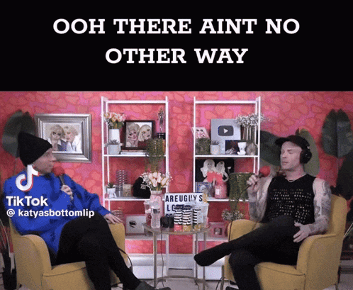 Two Men Sitting In Chairs In Front Of Pink TikTok Sign GIF