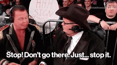 Two Men Sitting In Front Of Crowd With Stop Sign GIF