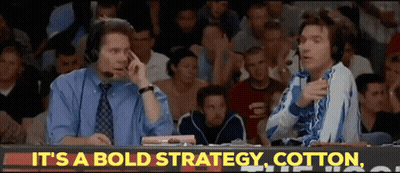 Two Men Sitting In Front Of It's A Bold Strategy Sign GIF
