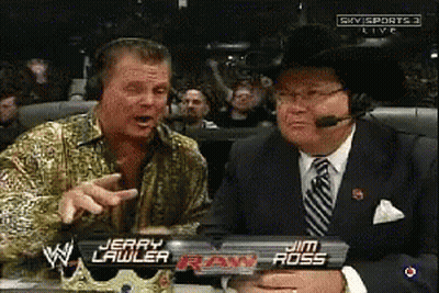 Two Men Sitting In Front Of Jim Ross And Jerry Lawler Sign GIF