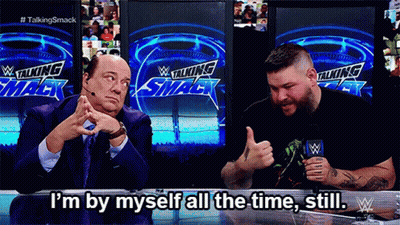 Two Men Sitting In Front Of Talking Smack Sign GIF