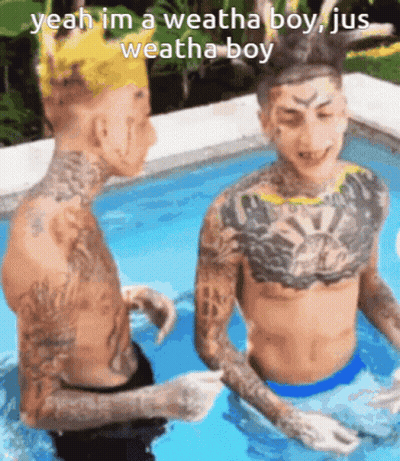 Two Men Sitting In Pool One Wearing Crown GIF