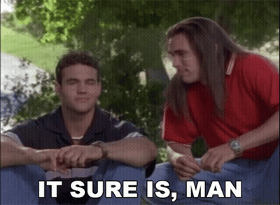 Two Men Sitting It Sure Is Man GIF