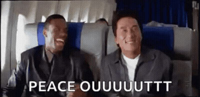 Two Men Sitting Next To Each Other On Airplane GIF