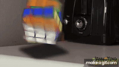 Two Men Sitting Next To Each Other One Green Jacket GIF