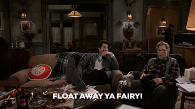 Two Men Sitting On A Couch With The Words " Float Away Ya Fairy " GIF